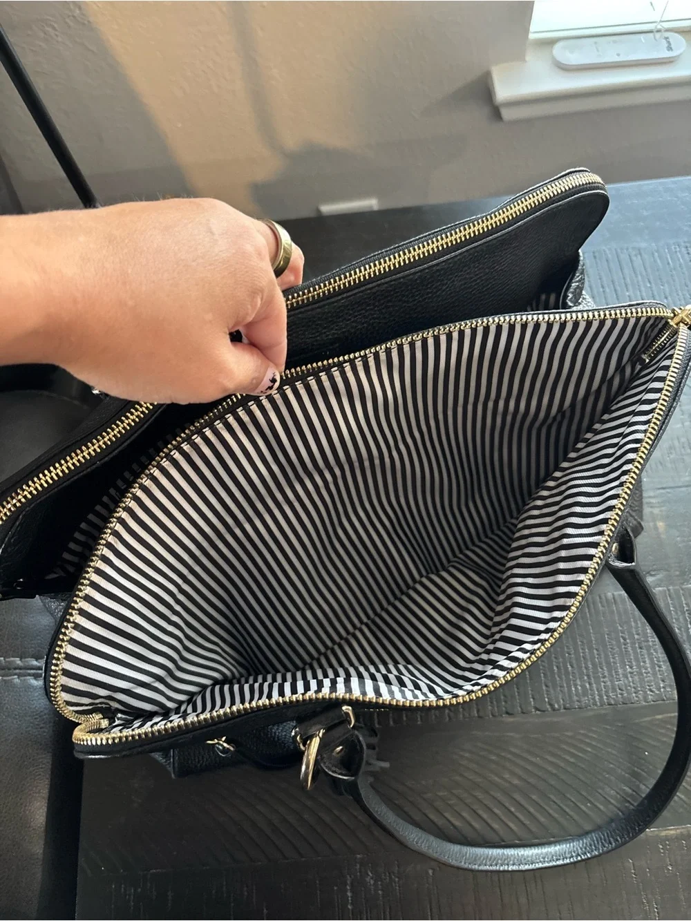 kate spade Black Pebbled Leather Tote with Tassel and Gold Hardware